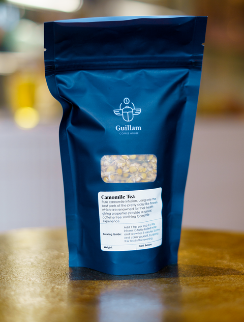 Camomile tea herbs product  in a dark blue package 