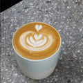 Freshly brewed coffee latte with fruit-forward sweetness flavour in a ceramic cup