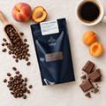 El Diviso speciality coffee flat lay with peaches, nectarines, apricots and milk chocolate